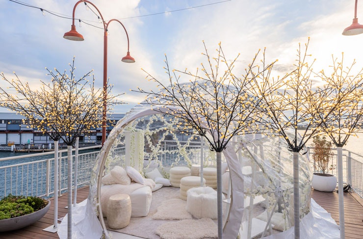 The pop-up igloo suite at Pier One hotel in Sydney, with Walsh Bay in the background.